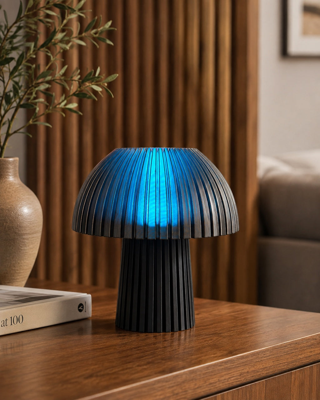 Lámpara Seta Mini en Carbón con la luz RGB en azul